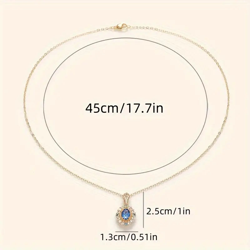 Златен Necklace с овален сапфир и двойно хало
