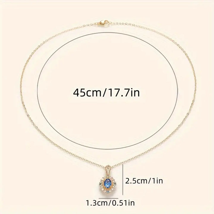Златен Necklace с овален сапфир и двойно хало